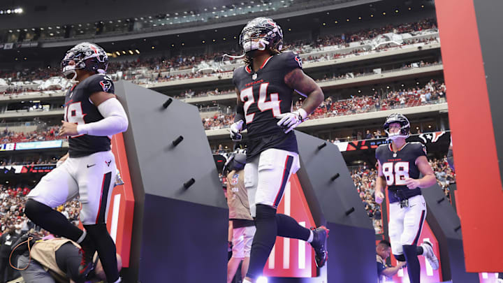 Sep 28, 2025; Houston, Texas, USA; Houston Texans cornerback Derek Stingley Jr. (24) runs onto the field before the game against the Tennessee Titans at NRG Stadium. Mandatory Credit: Troy Taormina-Imagn Images
