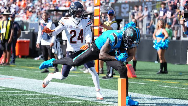 Panthers wide receiver Tetairoa McMillan is pushed out of bounds by Bears cornerback Malik Muhammad. Panthers wide receiver Tetairoa McMillan is pushed out of bounds by Bears cornerback Malik Muhammad.