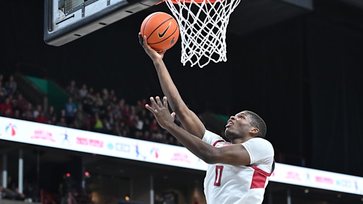 Nov 21, 2024; Spokane, Washington, USA; Washington State Cougars guard Cedric Coward (0) makes an easy lay up against the Eastern Washington Eagles in the first half at Spokane Veterans Memorial Arena. Mandatory Credit: James Snook-Imagn Images