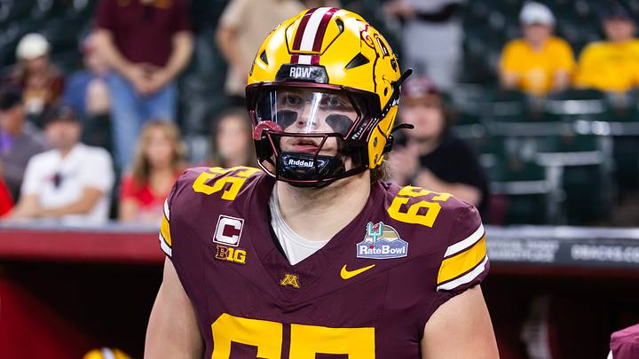 Dec 26, 2025; Phoenix, AZ, USA; Minnesota Golden Gophers offensive lineman Greg Johnson (65) against the New Mexico Lobos during the Rate Bowl at Chase Field. Mandatory Credit: Mark J. Rebilas-Imagn Images Dec 26, 2025; Phoenix, AZ, USA; Minnesota Golden Gophers offensive lineman Greg Johnson (65) against the New Mexico Lobos during the Rate Bowl at Chase Field. Mandatory Credit: Mark J. Rebilas-Imagn Images