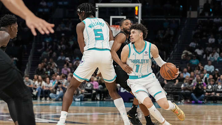 Charlotte Hornets guard LaMelo Ball (1) follows a pick by center Mark Williams (5) during the first quarter against the Brooklyn Nets at Spectrum Center.