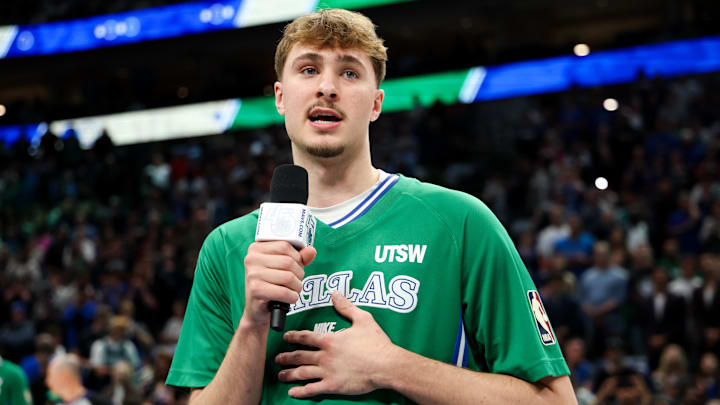 Apr 12, 2026; Dallas, Texas, USA; Dallas Mavericks forward Cooper Flagg (32) speaks to the crowd before the game against the Chicago Bulls at American Airlines Center.