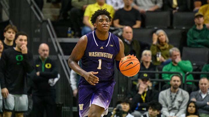 Jan 21, 2025; Eugene, Oregon, USA; Washington Huskies forward Great Osobor (1) dribbles against the Oregon Ducks during the second half at Matthew Knight Arena. Mandatory Credit: Craig Strobeck-Imagn Images
