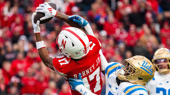 Nov 2, 2024; Lincoln, Nebraska, USA; Nebraska Cornhuskers wide receiver Jacory Barney Jr. makes a catch against UCLA Bruins defensive back K.J. Wallace during the third quarter at Memorial Stadium. Nov 2, 2024; Lincoln, Nebraska, USA; Nebraska Cornhuskers wide receiver Jacory Barney Jr. makes a catch against UCLA Bruins defensive back K.J. Wallace during the third quarter at Memorial Stadium.