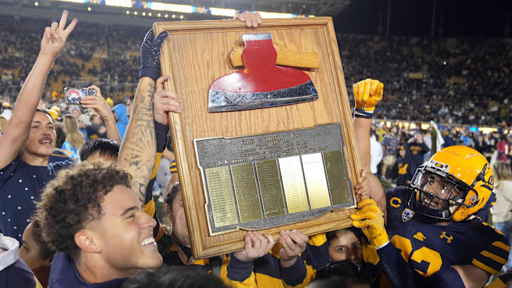 Cal players display The Axe after winning the 2022 Big Game