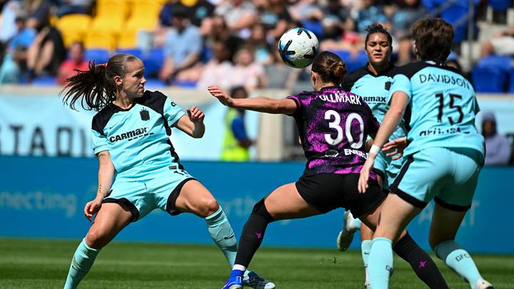 Guro Reiten, Jess Carter, and Tierna Davidson of Gotham FC