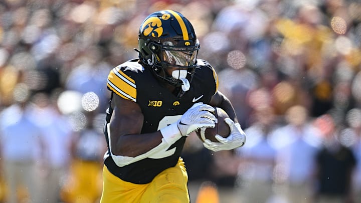 Sep 7, 2024; Iowa City, Iowa, USA; Iowa Hawkeyes running back Kaleb Johnson (2) runs for a 27 yard touchdown against the Iowa State Cyclones during the first quarter at Kinnick Stadium.