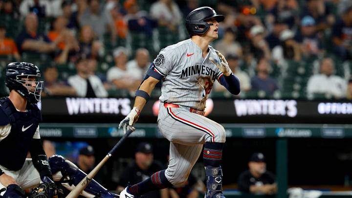 Jun 9, 2026; Detroit, Michigan, USA;  Minnesota Twins shortstop Brooks Lee (22) hits a home run in the fifth inning against the Detroit Tigers at Comerica Park. Mandatory Credit: Rick Osentoski-Imagn Images