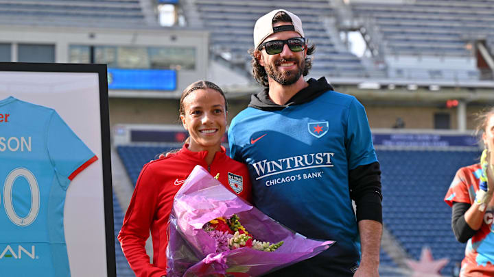 Oct 12, 2024; Bridgeview, Illinois, USA; Chicago Red Stars forward Mallory Swanson (9) with her husband Dansby Swanson as she is honored for her 100th cap before the game between the Chicago Red Stars and NJ/NY Gotham FC at SeatGeek Stadium. Mandatory Credit: Daniel Bartel-Imagn Images