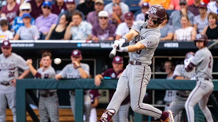 Texas A&M Aggies left fielder Caden Sorrell (13) hits a RBI single against the Tennessee Volunteers during the first inning at Charles Schwab Field Omaha. Texas A&M Aggies left fielder Caden Sorrell (13) hits a RBI single against the Tennessee Volunteers during the first inning at Charles Schwab Field Omaha.