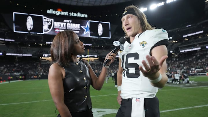 Nov 2, 2025; Paradise, Nevada, USA; Fox Sports reporter Kristina Pink (left) interviews Jacksonville Jaguars quarterback Trevor Lawrence (16) after the game against the Las Vegas Raiders at Allegiant Stadium. Mandatory Credit: Kirby Lee-Imagn Images