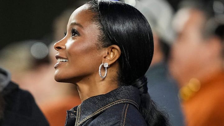 Loreal Sarkisian, wife of Texas Longhorns head coach Steve Sarkisian, watches warm ups before the game against Texas Tech at Darrell K Royal Texas Memorial Stadium.