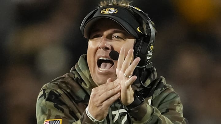 Nov 9, 2024; Columbia, Missouri, USA; Missouri Tigers head coach Eliah Drinkwitz calls a timeout during the first half against the Oklahoma Sooners at Faurot Field at Memorial Stadium. Mandatory Credit: Jay Biggerstaff-Imagn Images