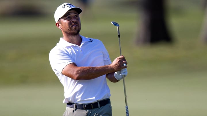 Apr 25, 2024; Avondale, Louisiana, USA;  Xander Schauffele plays his shot from the 13th fairway