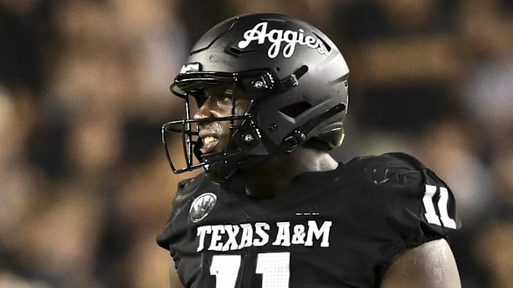 Oct 26, 2024; College Station, Texas, USA; Texas A&M Aggies defensive lineman Nic Scourton (11) reacts during the second quarter against the LSU Tigers. The Aggies defeated the Tigers 38-23; at Kyle Field. Mandatory Credit: Maria Lysaker-Imagn Images.  