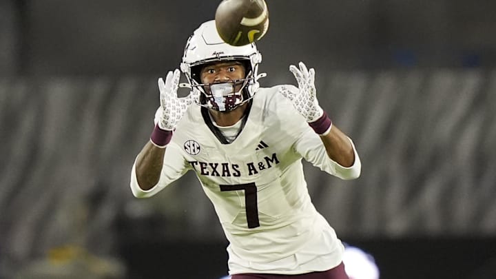 Nov 8, 2025; Columbia, Missouri, USA; Texas A&M Aggies wide receiver KC Concepcion (7) returns a punt during the second half against the Missouri Tigers at Faurot Field at Memorial Stadium. Mandatory Credit: Jay Biggerstaff-Imagn Images