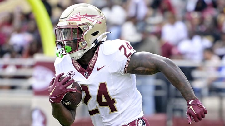 Apr 20, 2024; Tallahassee, Florida, USA; Florida State Seminoles running back Roydell Williams (24) runs the ball during the Spring Showcase at Doak S. Campbell Stadium. Mandatory Credit: Melina Myers-Imagn Images