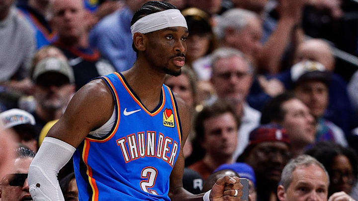 May 15, 2025; Denver, Colorado, USA; Oklahoma City Thunder guard Shai Gilgeous-Alexander (2) reacts from the sideline in the second quarter against the Denver Nuggets during game six of the second round for the 2025 NBA Playoffs at Ball Arena. Mandatory Credit: Isaiah J. Downing-Imagn Images