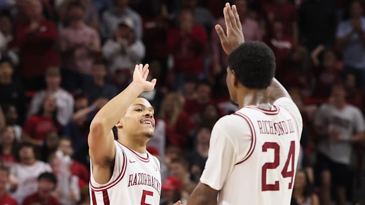 Arkansas Razorbacks guard Darius Acuff Jr (5) celebrates with wing Billy Richmond III (24) during the second half against the Texas Longhorns at Bud Walton Arena. Arkansas won 105-85. 