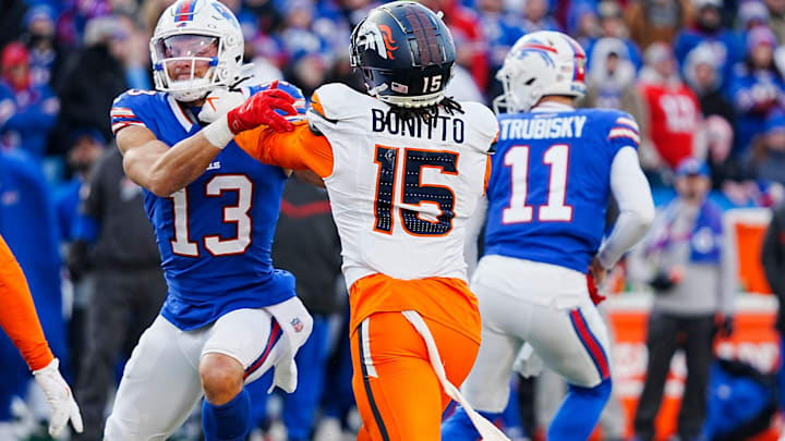 Buffalo Bills wide receiver Mack Hollins blocks against Denver Broncos Nik Bonitto during the second half of the Buffalo Bills wild card game against the Denver Broncos at Highmark Stadium in Orchard Park on Jan. 12, 2025.
