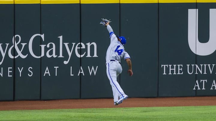 Apr 12, 2023; Arlington, Texas, USA;  Kansas City Royals left fielder Edward Olivares (14) makes a