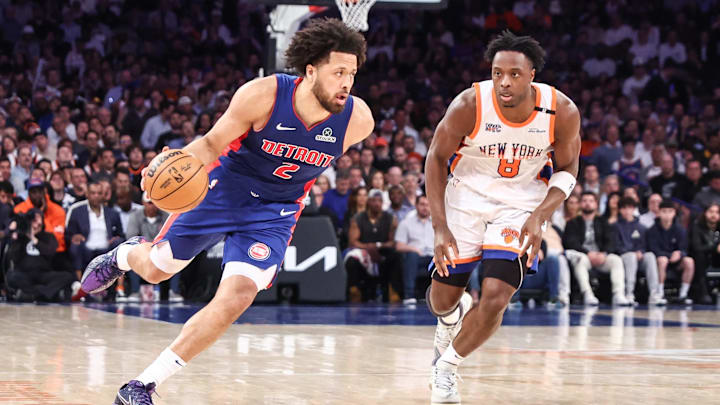 Apr 29, 2025; New York, New York, USA; Detroit Pistons guard Cade Cunningham (2) drives past New York Knicks forward OG Anunoby (8) in the second quarter during game five of first round for the 2025 NBA Playoffs at Madison Square Garden. Mandatory Credit: Wendell Cruz-Imagn Images