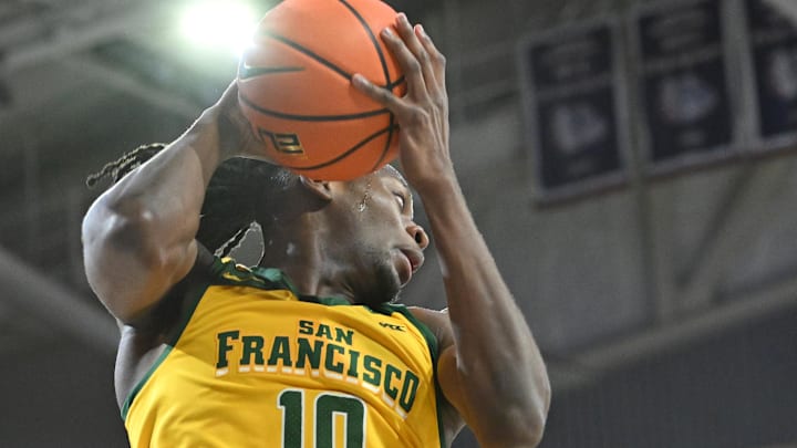 Jan 25, 2024; Spokane, Washington, USA; San Francisco Dons forward Jonathan Mogbo (10) rebounds the ball
against the Gonzaga Bulldogs in the first half at McCarthey Athletic Center. Mandatory Credit: James Snook-USA TODAY Sports Jan 25, 2024; Spokane, Washington, USA; San Francisco Dons forward Jonathan Mogbo (10) rebounds the ball
against the Gonzaga Bulldogs in the first half at McCarthey Athletic Center. Mandatory Credit: James Snook-USA TODAY Sports