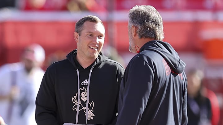 Nov 4, 2023; Salt Lake City, Utah, USA; Arizona State Sun Devils head coach Kenny Dillingham speaks with Utah Utes head coach Kyle Whittingham before a game at Rice-Eccles Stadium. Mandatory Credit: Rob Gray-Imagn Images