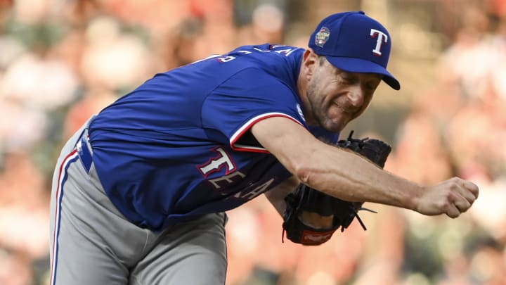 Jun 28, 2024; Baltimore, Maryland, USA;  Texas Rangers pitcher Max Scherzer (31) reacts after throwing a first-inning pitch against the Baltimore Orioles at Oriole Park at Camden Yards. Mandatory Credit: Tommy Gilligan-USA TODAY Sports