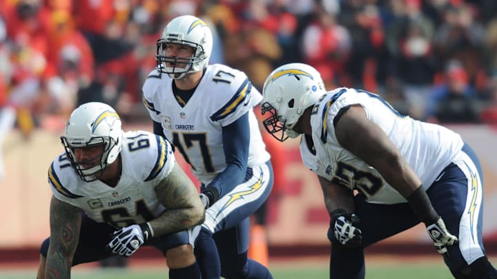 Nov 24, 2013; Kansas City, MO, USA; San Diego Chargers quarterback Philip Rivers (17) goes under Nov 24, 2013; Kansas City, MO, USA; San Diego Chargers quarterback Philip Rivers (17) goes under