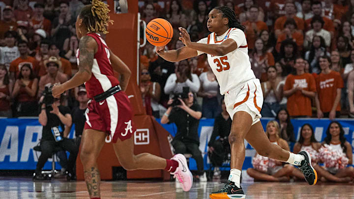 Texas Longhorns guard Madison Booker (35) passes the ball during the NCAA playoff game against
