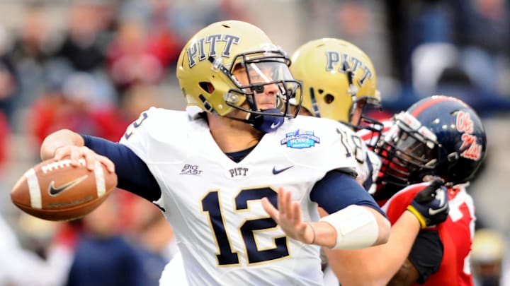 Jan. 5, 2013; Birmingham, AL, USA; Pittsburgh Panthers quarterback Tino Sunseri (12) throws a pass during the fourth quarter of the BBVA Compass Bowl against the Mississippi Rebels at Legion Field. Mississippi won 38-17. Mandatory Credit: Kelly Lambert-Imagn Images