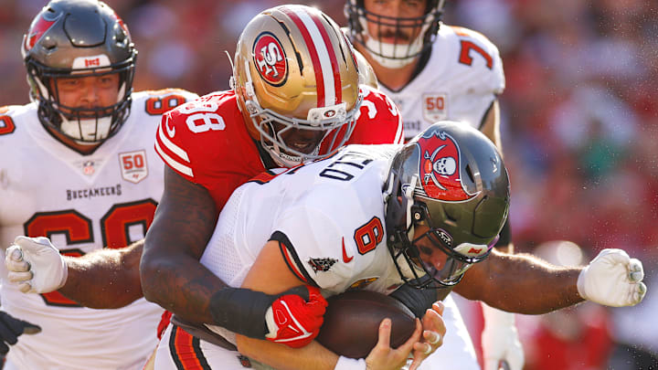 San Francisco 49ers defensive end Mykel Williams (98) sacks Tampa Bay Buccaneers quarterback Baker Mayfield (6) San Francisco 49ers defensive end Mykel Williams (98) sacks Tampa Bay Buccaneers quarterback Baker Mayfield (6)