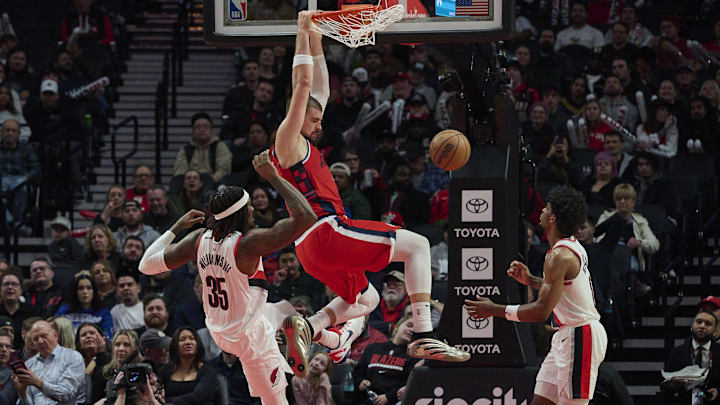 Jan 16, 2025; Portland, Oregon, USA; LA Clippers center Ivica Zubac (40) dunks the basketball during the second half against Portland Trail Blazers center Robert Williams III (35) and guard Scoot Henderson (00) at Moda Center. Mandatory Credit: Troy Wayrynen-Imagn Images Jan 16, 2025; Portland, Oregon, USA; LA Clippers center Ivica Zubac (40) dunks the basketball during the second half against Portland Trail Blazers center Robert Williams III (35) and guard Scoot Henderson (00) at Moda Center. Mandatory Credit: Troy Wayrynen-Imagn Images