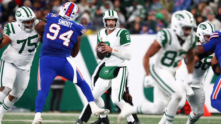 Oct 14, 2024; East Rutherford, New Jersey, USA; New York Jets quarterback Aaron Rodgers (8) looks to pass against the Buffalo Bills during the first half at MetLife Stadium. Mandatory Credit: Ed Mulholland-Imagn Images