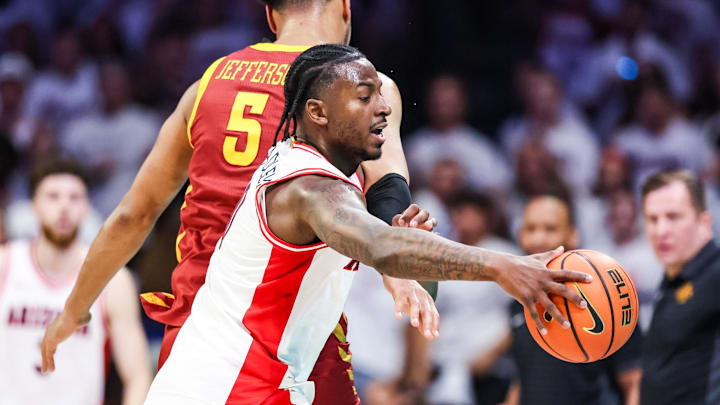 Mar 2, 2026; Tucson, Arizona, USA; Iowa State Cyclones forward Joshua Jefferson (5) fouls Arizona Wildcats guard Jaden Bradley (0) during the first half of the game at McKale Memorial Center. Mandatory Credit: Aryanna Frank-Imagn Images