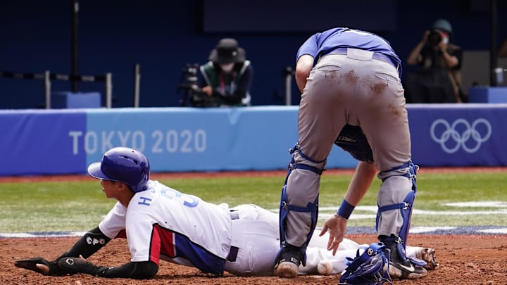 Aug 2, 2021; Yokohama, Japan; Team South Korea infielder Hyeseong Kim (3) scores a run past Team Israel catcher Ryan Lavarnway (36) during the Tokyo 2020 Olympic Summer Games at Yokohama Baseball Stadium. Mandatory Credit: Mandi Wright-Imagn Images