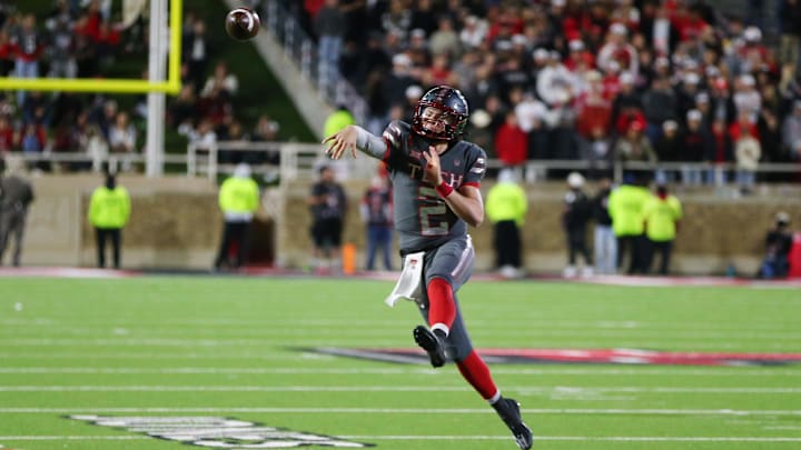 Nov 9, 2024; Lubbock, Texas, USA; Texas Tech Red Raiders quarterback Behren Morton (2) throws a pass in the second half against the Colorado Buffalos at Jones AT&T Stadium and Cody Campbell Field. Mandatory Credit: Michael C. Johnson-Imagn Images