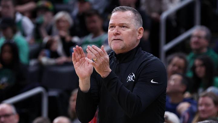 Mar 2, 2025; Boston, Massachusetts, USA; Denver Nuggets head coach Michael Malone reacts during the first half against the Boston Celtics at TD Garden. Mandatory Credit: Paul Rutherford-Imagn Images