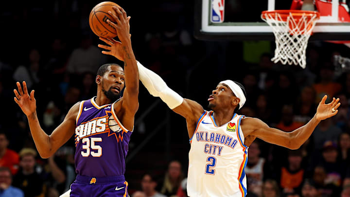 Mar 3, 2024; Phoenix, Arizona, USA; Phoenix Suns forward Kevin Durant (35) and Oklahoma City Thunder