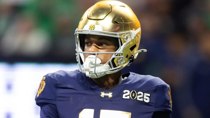 Jan 20, 2025; Atlanta, GA, USA; Notre Dame Fighting Irish cornerback Leonard Moore (15) against the Ohio State Buckeyes during the CFP National Championship college football game at Mercedes-Benz Stadium. Mandatory Credit: Mark J. Rebilas-Imagn Images