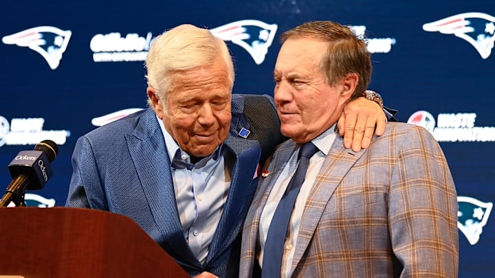 Jan 11, 2024; Foxborough, MA, USA; New England Patriots former head coach Bill Belichick (right) embraces Patriots owner Robert Kraft (left) during a press conference at Gillette Stadium to announce Belichick's exit from the team.
