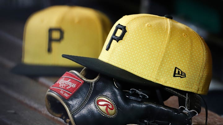 Sep 16, 2023; Pittsburgh, Pennsylvania, USA; Pittsburgh Pirates hats and gloves in the dugout against the New York Yankees during the sixth inning at PNC Park. Sep 16, 2023; Pittsburgh, Pennsylvania, USA; Pittsburgh Pirates hats and gloves in the dugout against the New York Yankees during the sixth inning at PNC Park.