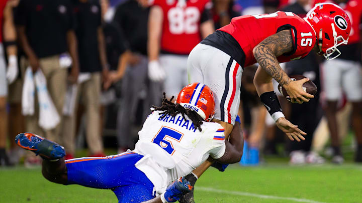 Florida Gators linebacker Myles Graham (5) sacks Georgia Bulldogs quarterback Carson Beck (15) during the second half at EverBank Stadium in Jacksonville, FL on Saturday, November 2, 2024. The Bulldogs defeated the Gators 34-20. [Doug Engle/Gainesville Sun]