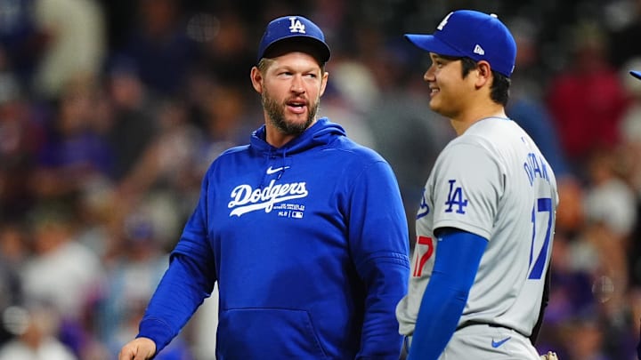 Sep 28, 2024; Denver, Colorado, USA; Los Angeles Dodgers pitcher Clayton Kershaw (22) and designated hitter Shohei Ohtani (17) celebrate defeating the Colorado Rockies at Coors Field. Mandatory Credit: Ron Chenoy-Imagn Images Sep 28, 2024; Denver, Colorado, USA; Los Angeles Dodgers pitcher Clayton Kershaw (22) and designated hitter Shohei Ohtani (17) celebrate defeating the Colorado Rockies at Coors Field. Mandatory Credit: Ron Chenoy-Imagn Images