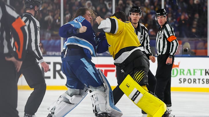 Feb 1, 2026; Tampa Bay, Florida, USA; Tampa Bay Lightning goaltender Andrei Vasilevskiy (88) and Boston Bruins goaltender Jeremy Swayman (1) fight during the second period in the 2026 Stadium Series ice hockey game at Raymond James Stadium. Mandatory Credit: Kim Klement Neitzel-Imagn Images