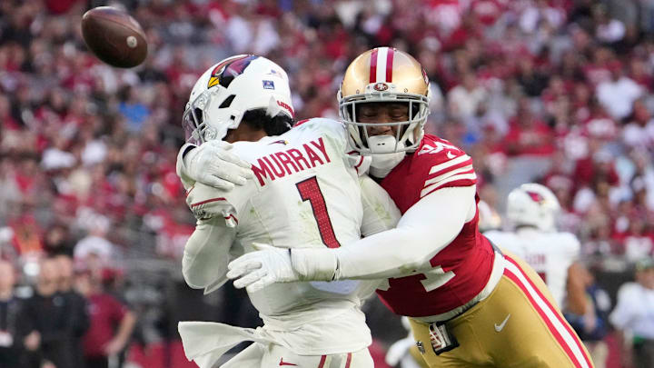 Dec 17, 2023; Glendale, Ariz, United States; Arizona Cardinals quarterback Kyler Murray (1) delivers a pass while hit by San Francisco 49ers defensive end Clelin Ferrell (94) during the third quarter at State Farm Stadium. Mandatory Credit: Michael Chow-Arizona Republic Dec 17, 2023; Glendale, Ariz, United States; Arizona Cardinals quarterback Kyler Murray (1) delivers a pass while hit by San Francisco 49ers defensive end Clelin Ferrell (94) during the third quarter at State Farm Stadium. Mandatory Credit: Michael Chow-Arizona Republic