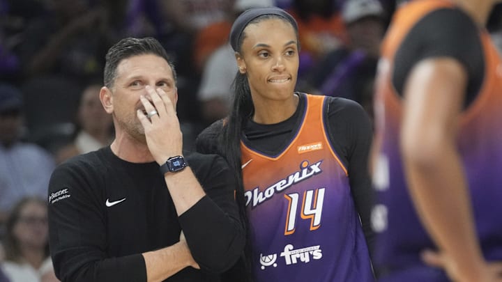 Phoenix Mercury head coach Nate Tibbetts talks with forward DeWanna Bonner (14) during the fourth quarter against the Minnesota Lynx at PHX Arena on July 9, 2025. Phoenix Mercury head coach Nate Tibbetts talks with forward DeWanna Bonner (14) during the fourth quarter against the Minnesota Lynx at PHX Arena on July 9, 2025.