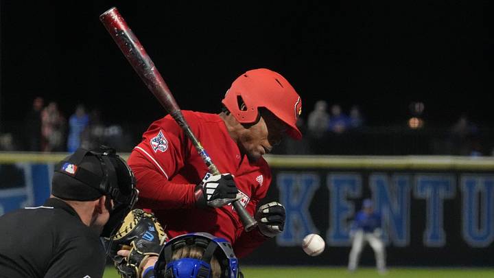 Louisville's Zion Rose (32) gets hit by the pitch against Kentucky at Kentucky Proud Park.
April 7, 2026 Louisville's Zion Rose (32) gets hit by the pitch against Kentucky at Kentucky Proud Park.
April 7, 2026