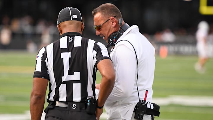 Oct 26, 2024; Nashville, Tennessee, USA;  Texas Longhorns head coach Steve Sarkisian talks with the line judge during a time out against the Vanderbilt Commodores during the first half at FirstBank Stadium. Mandatory Credit: Steve Roberts-Imagn Images
